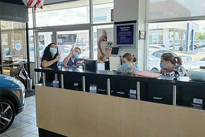 dealership-inside-with-employees